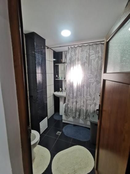 Nehoiu, centru, strada N. Costache, bloc A6, ap. 2, parter - 9