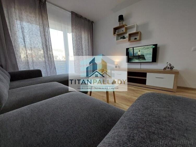 Apartament cu 3 camere decomandat în Titan