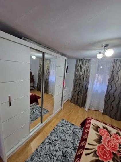 Casa de vanzare Baile?ti 100 mp, curte proprie - 4