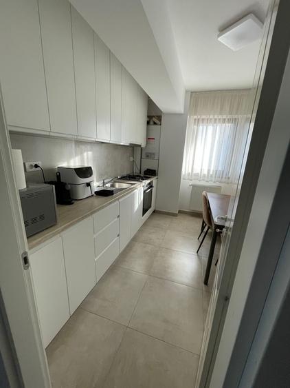 3 CD  mobilat si utilat Soseaua Voinesti  cu loc de parcare inclus - 2