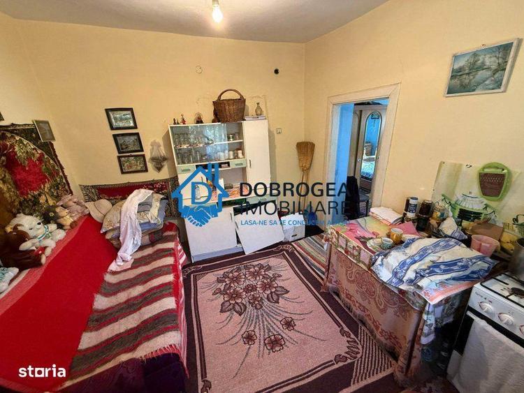 Caslita - teren 513 mp, pomi fructiferi, casa 2 camere - 4