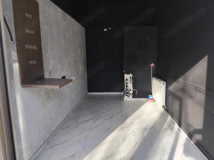 Saptiu de inchiriat 12 mp Bd Regel Mihai 1 - 4