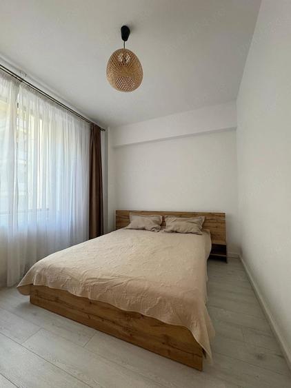 Apartament cu 2 camere semidecomandat, mobilat în Torontalului