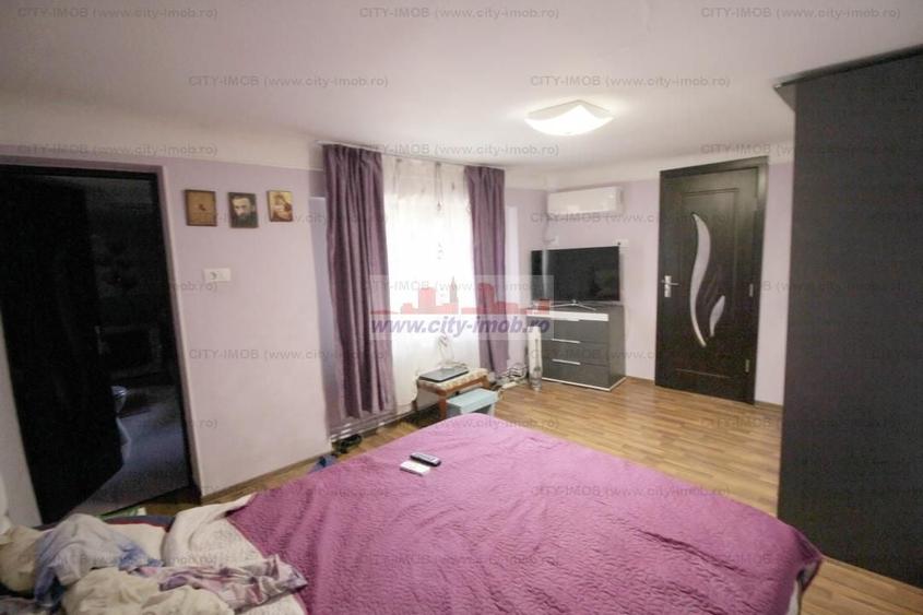 Casă individuală cu 5 camere decomandat cu Canalizare în Timpuri Noi