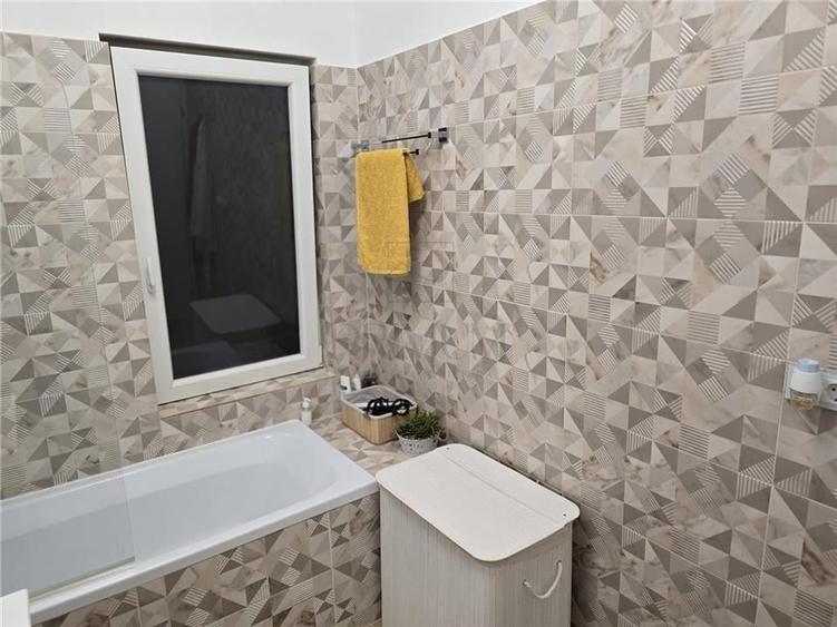 DUMBRAVITA - ETAJ 1 - LOC DE PARCARE - 3 camere - 2 bai - terasa - incalzire par - 11