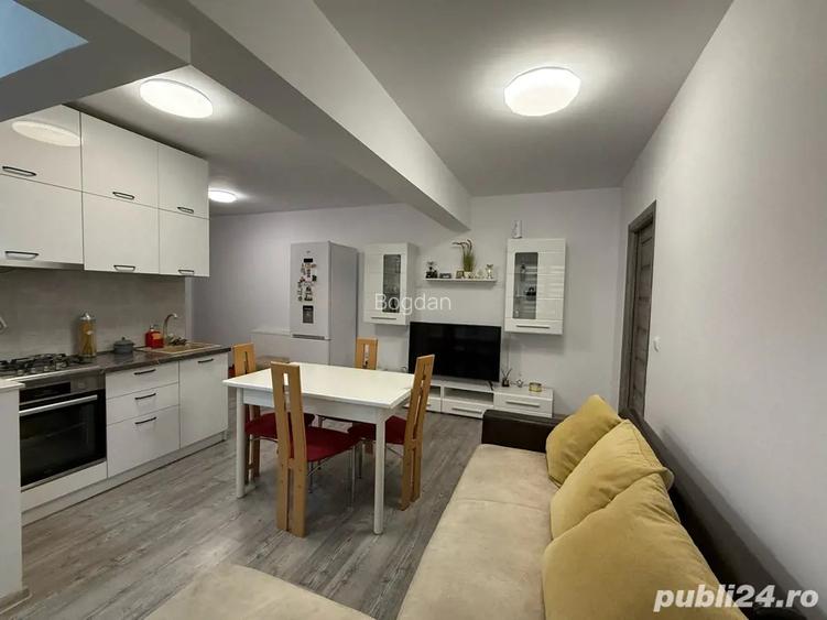 Apartament cu loc de parcare si curte Apartament cu loc de parcare si curte