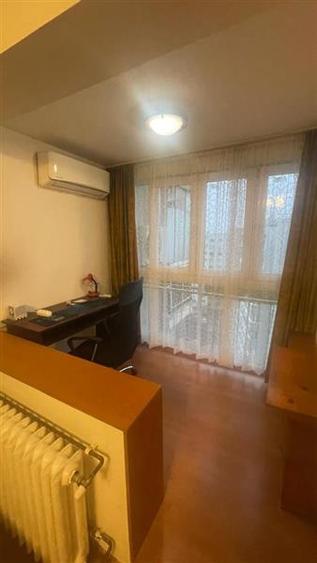 Dristor, garsoniera luminoasa in bloc mixt - 9