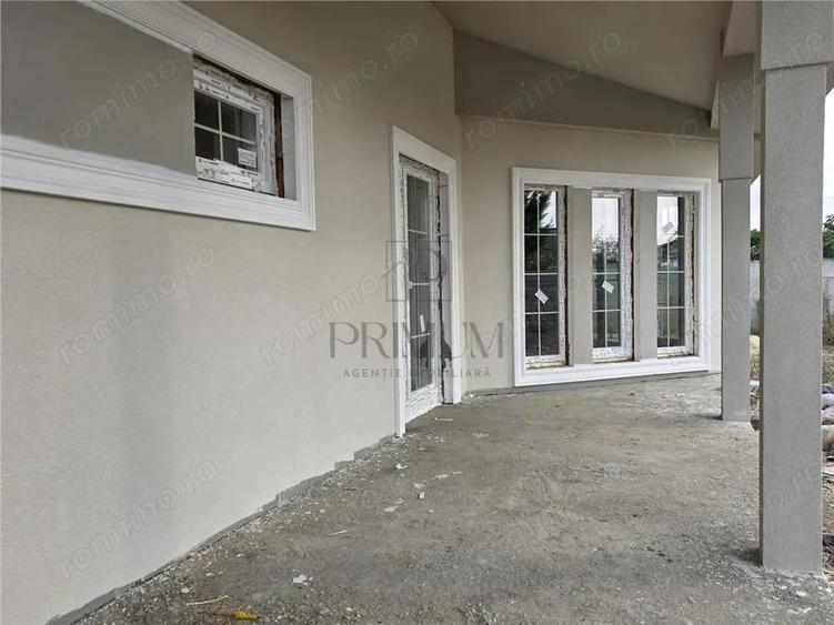 Casa individuala superba - teren 730 mp - garaj - 5 dormitoare - living 57mp. - 5