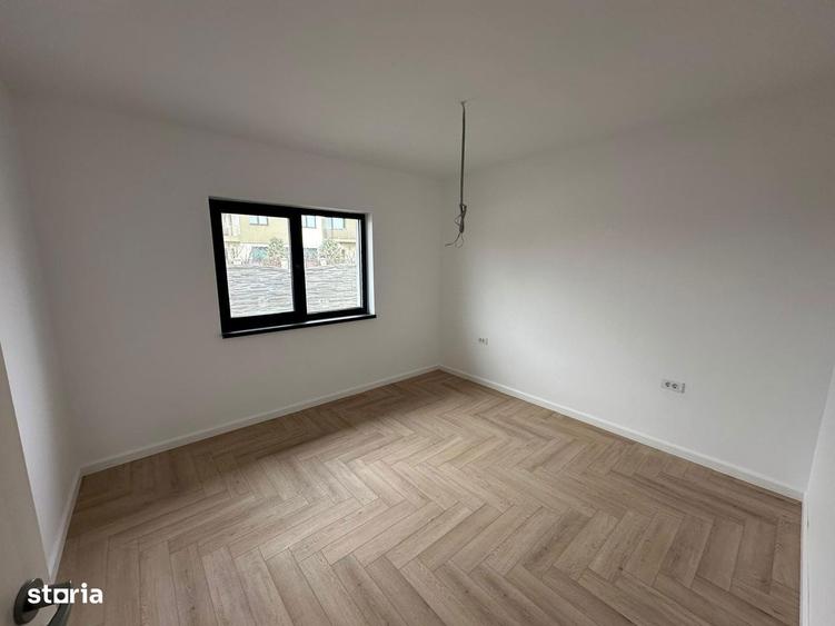 Casa pe parter cu incalzire in pardoseala si tripan - 5