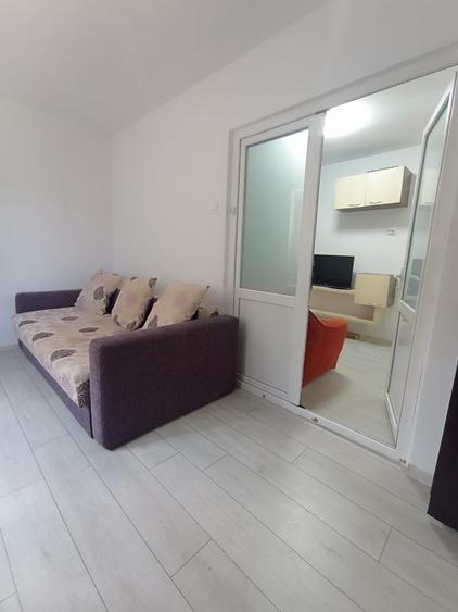 Apartament cu 2 camere decomandat în Podu Roș