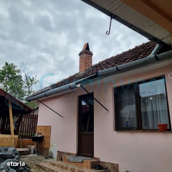 Casă cu 5 camere cu Teren 1611 Mp în Răbăgani