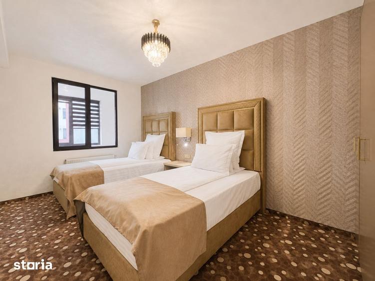 Apartament cu 3 camere decomandat în Tractorul