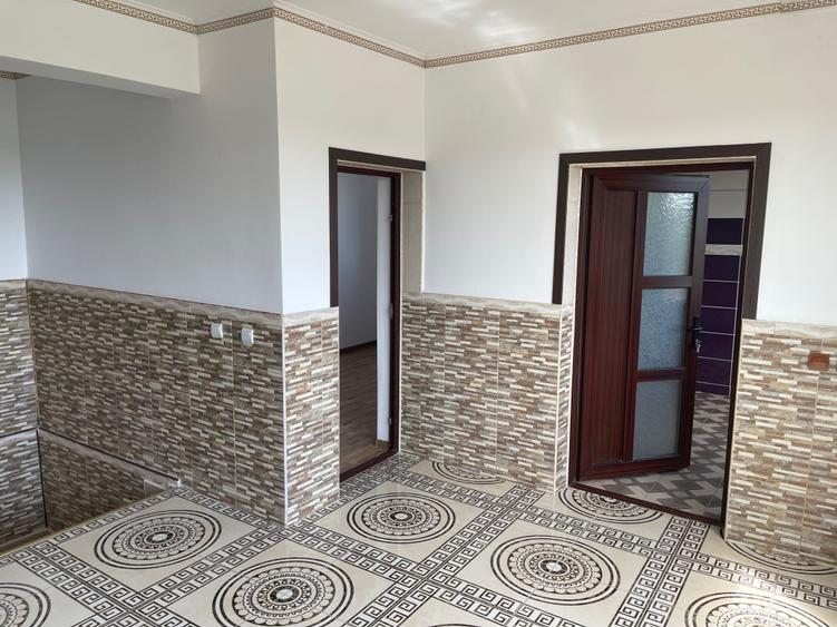 Casă cu 4 camere cu Teren 1000 Mp în Central