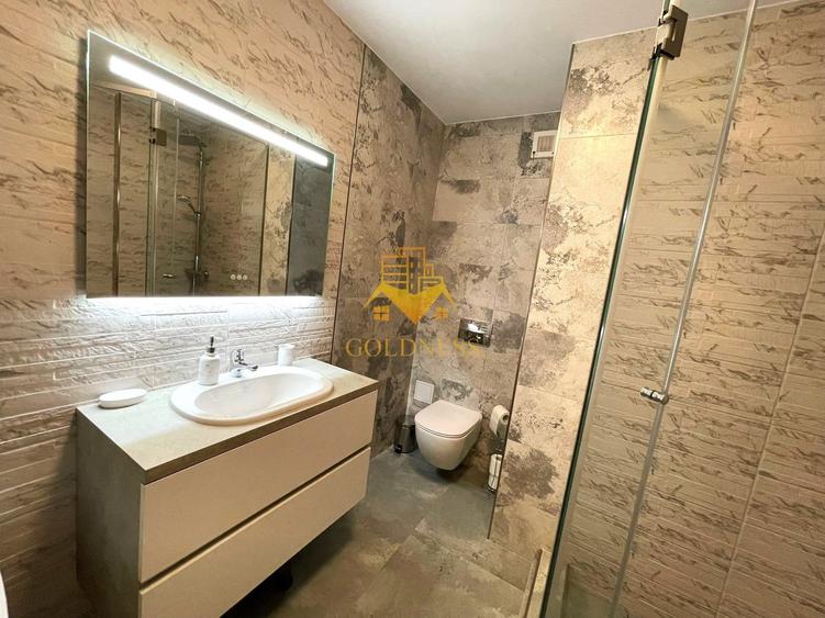 Apartament cu 2 camere semidecomandat, mobilat în Borhanci