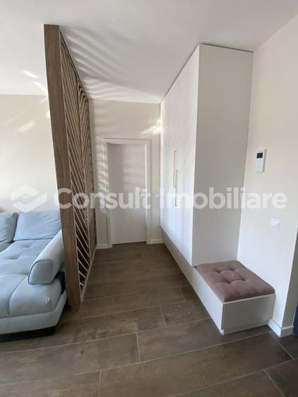 Apartament cu 2 camere semidecomandat, mobilat în Chinteni