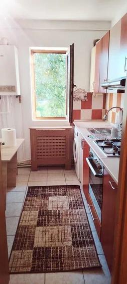 Apartament cu 2 camere nedecomandat, mobilat în Podu Roș