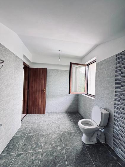 Casă cu 5 camere cu Teren 400 Mp în Central