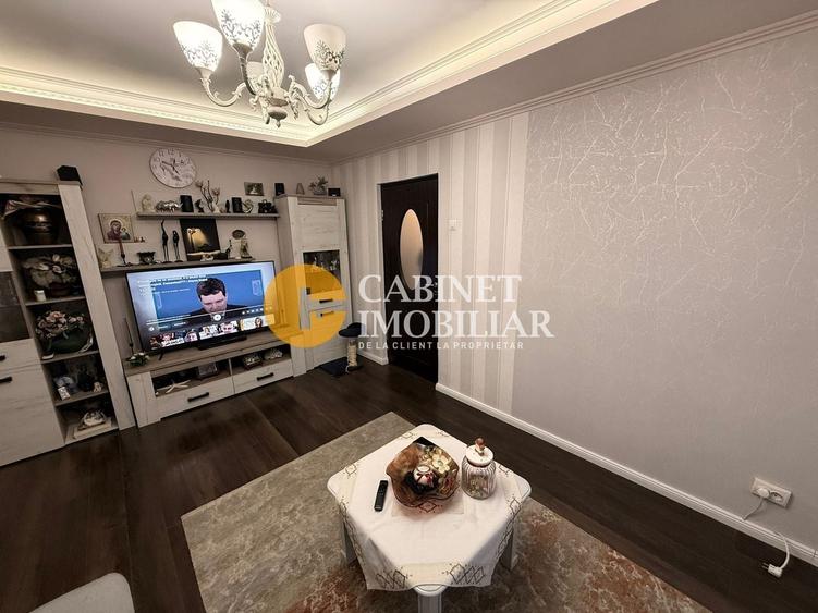 Apartament cu 3 camere semidecomandat, mobilat în Alexandru cel Bun