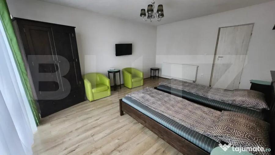 Casă cu 10 camere cu Teren 1100 Mp în Corunca