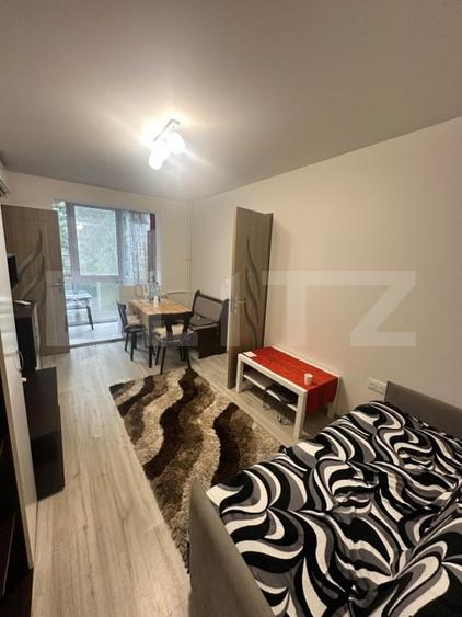 Apartament cu 3 camere semidecomandat, mobilat în Dacia