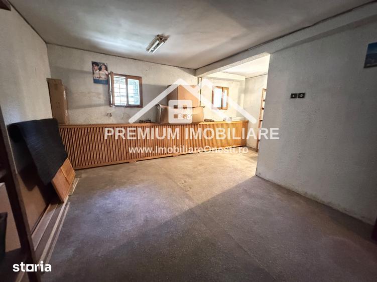 Apartament spa?ios cu 3 camere One?ti, zona centrala - 11