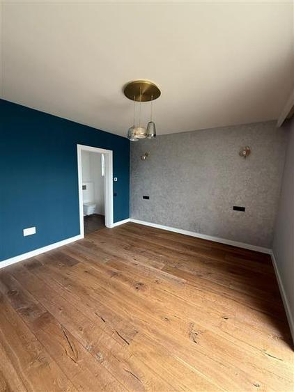Apartament cu 3 camere decomandat în Tractorul