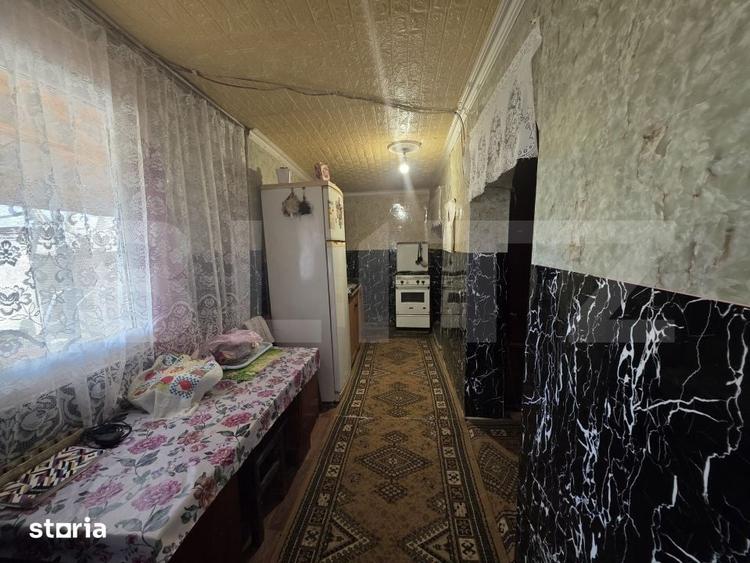 Casă cu 2 camere cu Teren 1336 Mp în Central