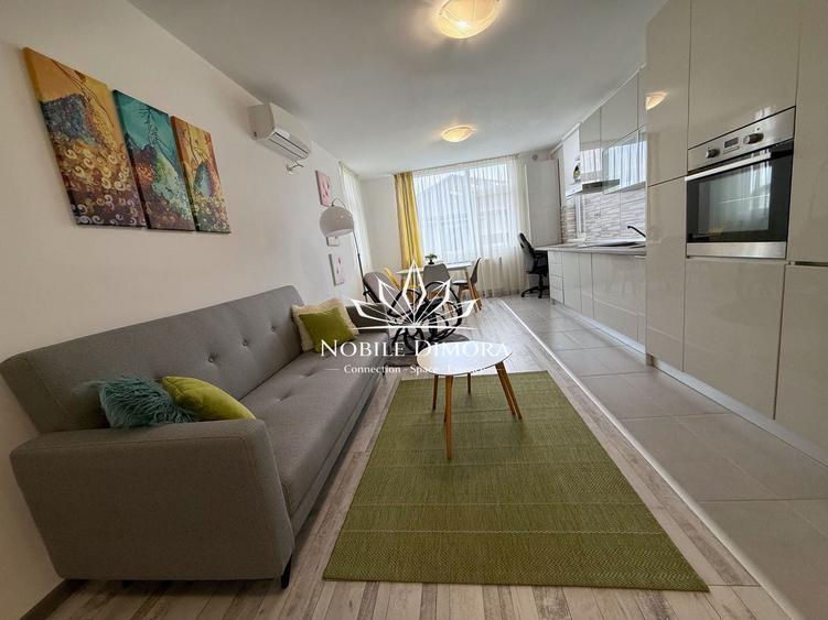 Apartament cu 2 camere semidecomandat, mobilat în Central