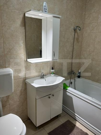 Apartament cu 2 camere semidecomandat, mobilat în Florești