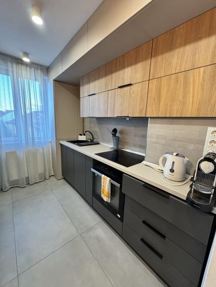 Apartament cu 2 camere semidecomandat, mobilat în Central