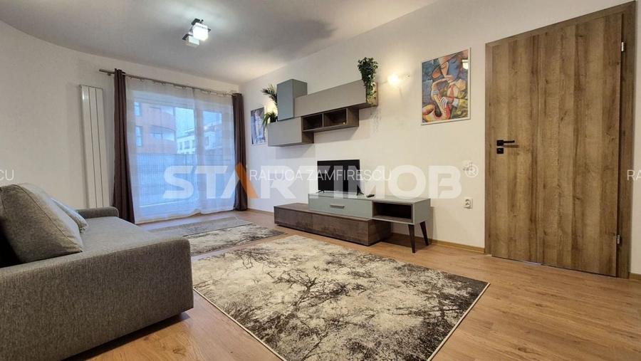 Apartament 2 camere cu parcare si curte proprie