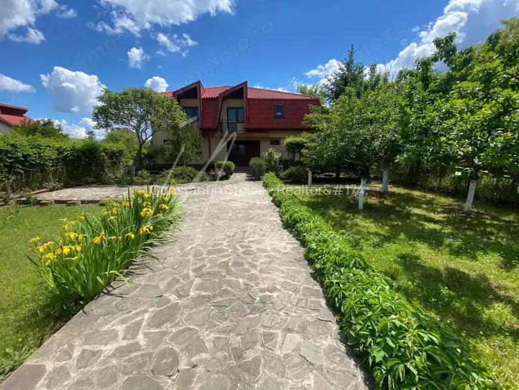 Casa cu buncar si o livada de 1000mp