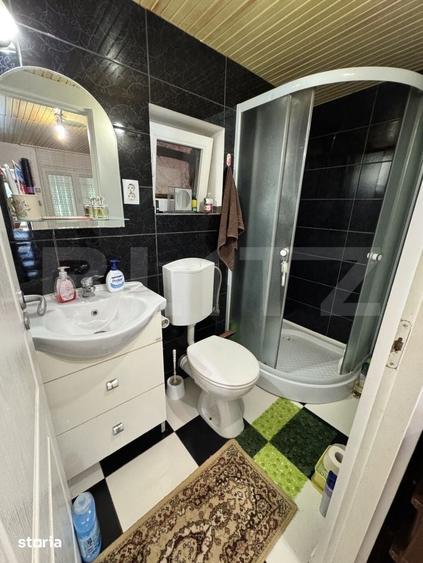 Casă cu 2 camere cu Teren 7300 Mp în Central