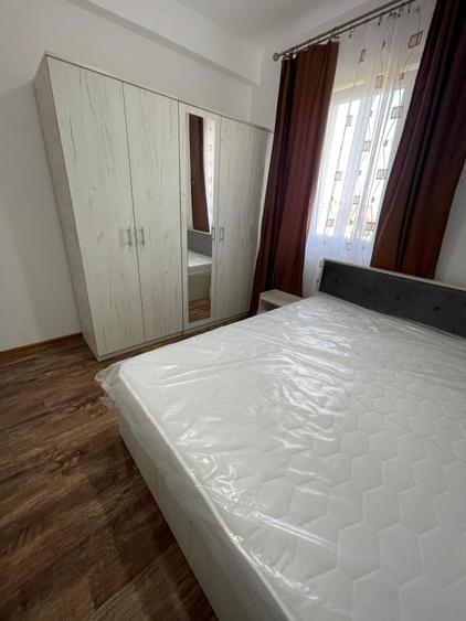 Apartament cu 3 camere semidecomandat, mobilat în Giroc