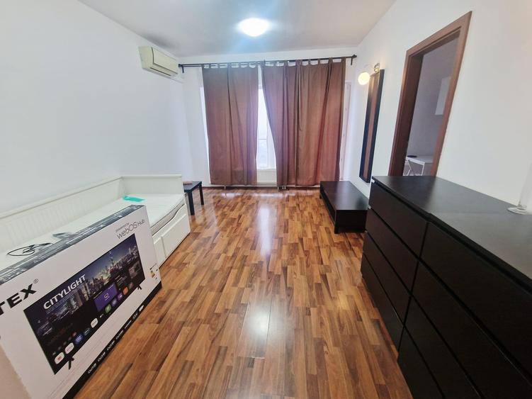 Garsoniera utilata si mobilata. terasa, centrala proprie de bloc, Titan - 1