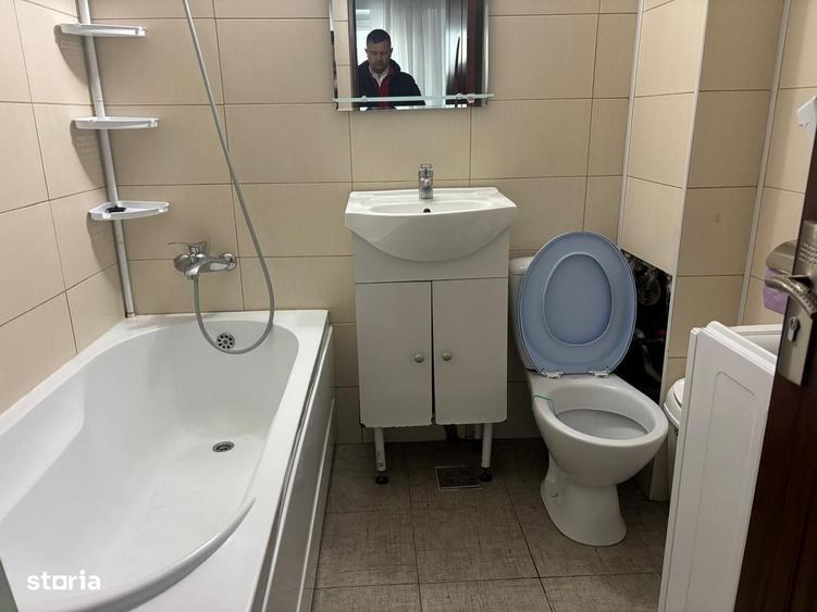 Apartament cu 2 camere decomandat, mobilat în Podul de Fier