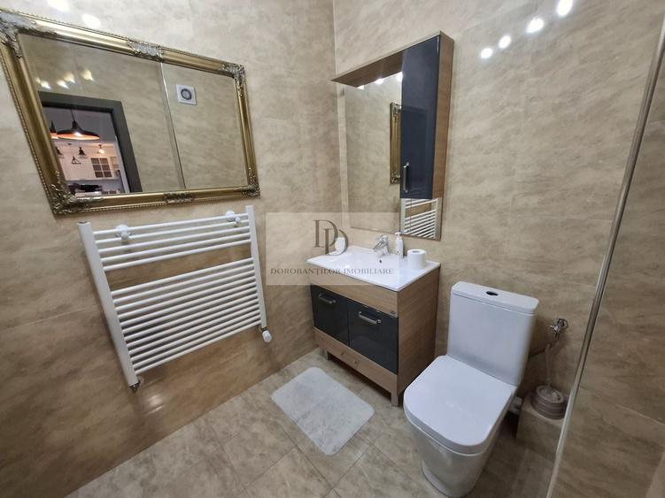 Apartament cu 2 camere semidecomandat, mobilat în Central