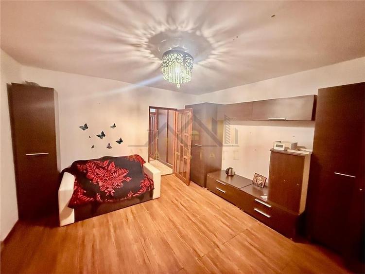 Apartament  2 camere, parter, 48 mp + centrala - Zona Dambovita - 1