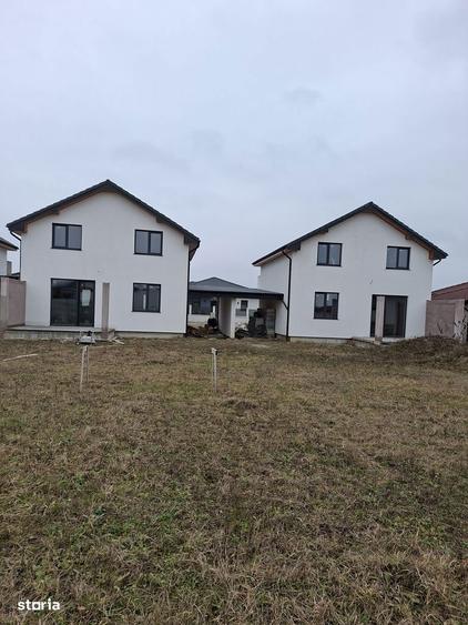 Casa Martinesti cu 3 camere+living, parcare acoperita ?i teren 450mp. - 2