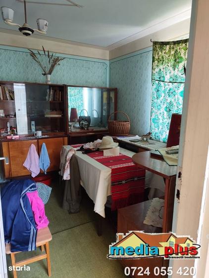 Casa cu teren 1374 mp in vatra veche a comunei Vanatori 56.000 Euro - 8