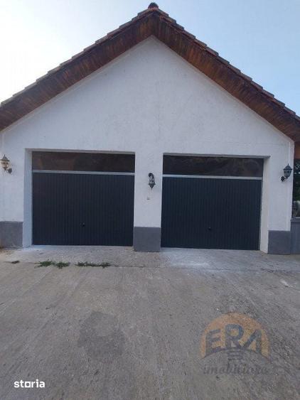 Casă cu 9 camere cu Teren 1600 Mp în Tileagd