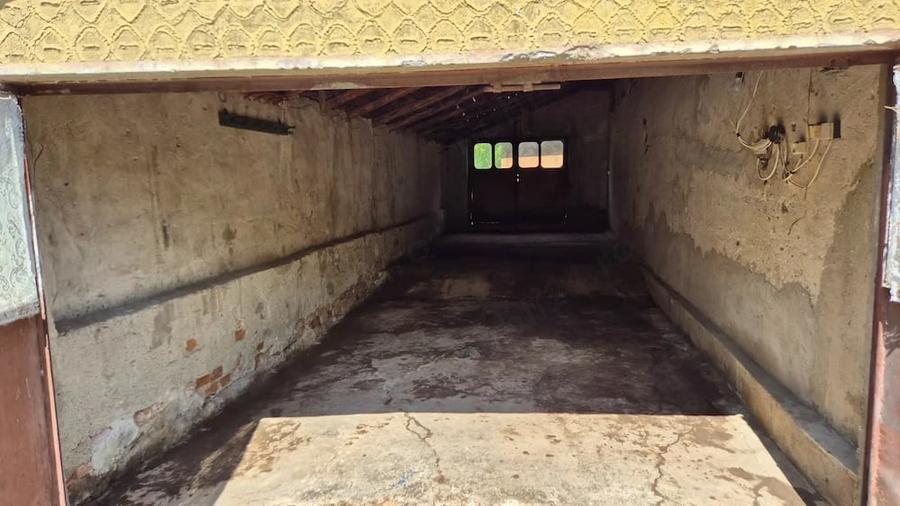 Casă cu Teren 1464 Mp în Plopșoru