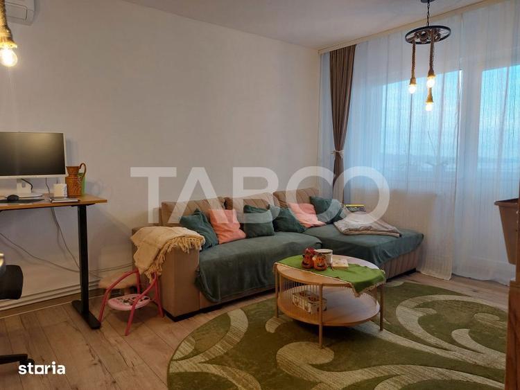 Apartament renovat 66 mp 3 camere 2 bai balcon pivnita Cisnadie - 2