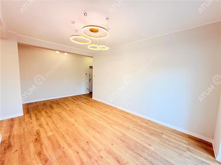 Apartament cu 3 camere decomandat în Șelimbăr — fotografia 3