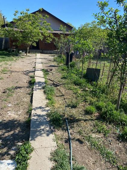 Proprietar vand casa constructie noua an 2024 pe un teren de 700 de m .Zona Ronat suprafata utila 90 - 8