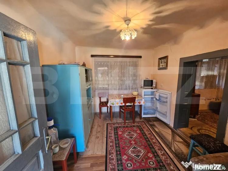 Casă cu 4 camere cu Teren 1000 Mp în Sâncel