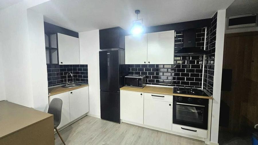 Apartament cu 2 camere semidecomandat, mobilat în Costin Georgian