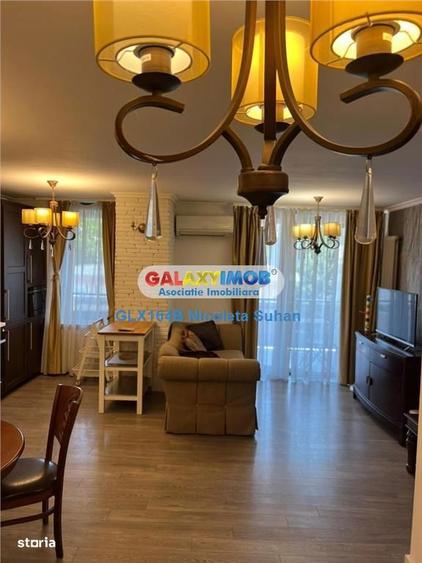 Apartament cu 3 camere, mobilat în Herăstrău — fotografia 3