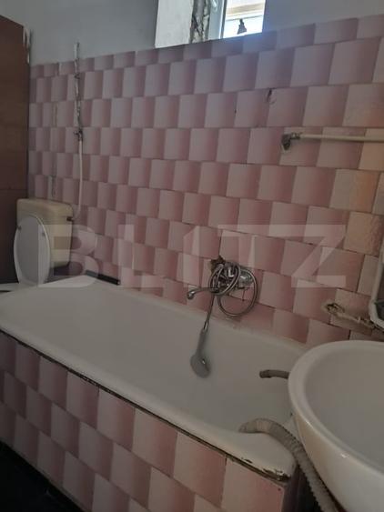 Casă individuală cu 3 camere cu Canalizare în Central