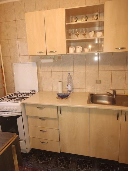 Persoana fizica vand apartament 2camere,parter - 4